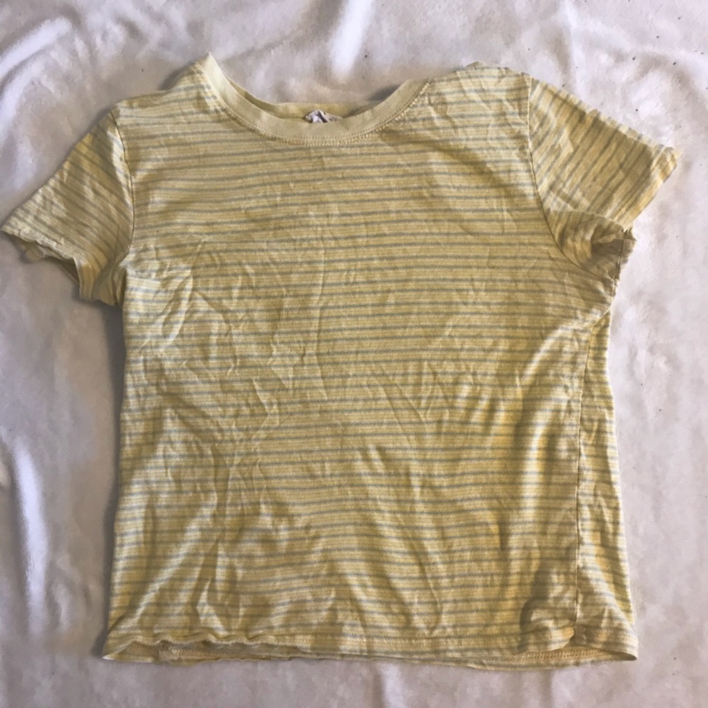 A yellow tee shirt